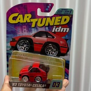 Red Toy Car 1983 Toyota celica